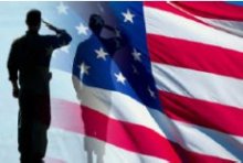 Military service member saluting the U.S. flag