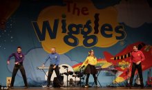 The Wiggles' from left, Lachy, Anthony Emma and Simon dance on stage during a performance in Canberra, Australia