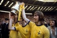 The Arsenal first wore a golden Yellow shirt in the FA CUP final in 1950 and again in the 1971 final. From elder fan’s I have spoke to the “she wore a yellow ribbon” song was sung in the late 50’s but took until the 70’s to really become popular.